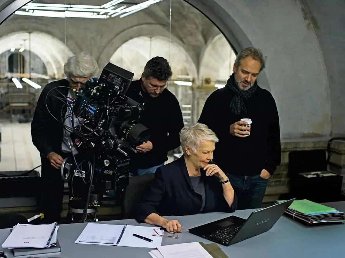 Judi Dench (center) and Director Sam Mendes (right) on the set of Metro-Goldwyn-Mayer Pictures/Columbia Pictures/EON Productions' action adventure SKYFALL.