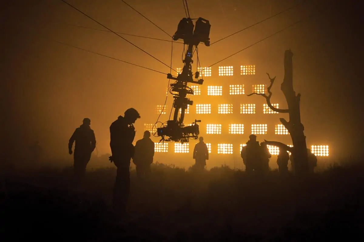 On the Scottish moor set with the lights representing fire in the background from Metro-Goldwyn-Mayer Pictures/Columbia Pictures/EON Productions’ action adventure SKYFALL.