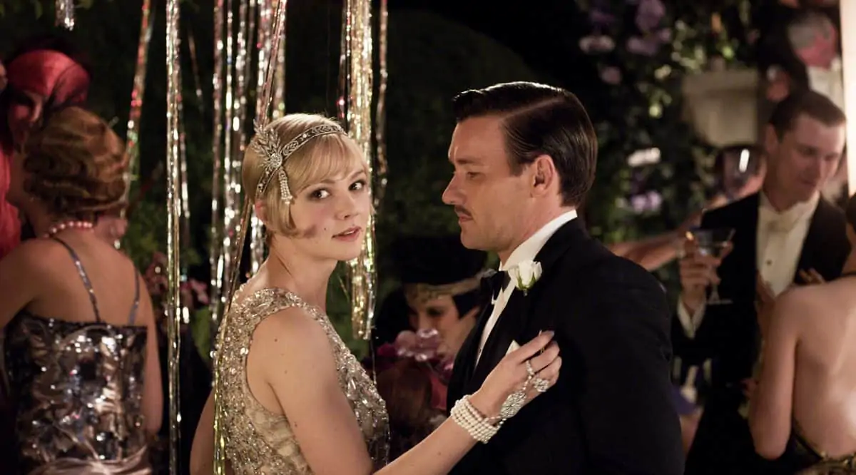 (L-r) CAREY MULLIGAN as Daisy Buchanan and JOEL EDGERTON as Tom Buchanan in Warner Bros. Pictures’ and Village Roadshow Pictures’ drama “THE GREAT GATSBY,” a Warner Bros. Pictures release.