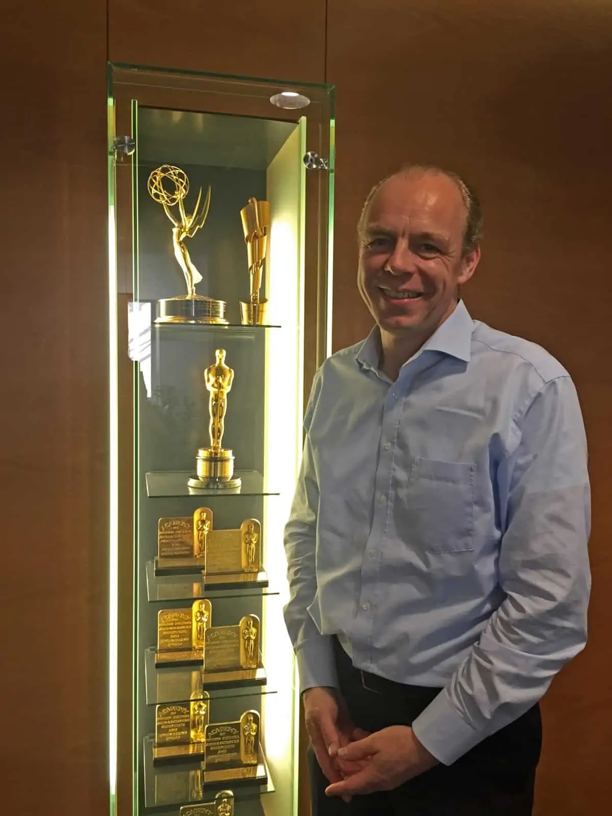 Stephan Schenk beside the ARRI trophy cabinet