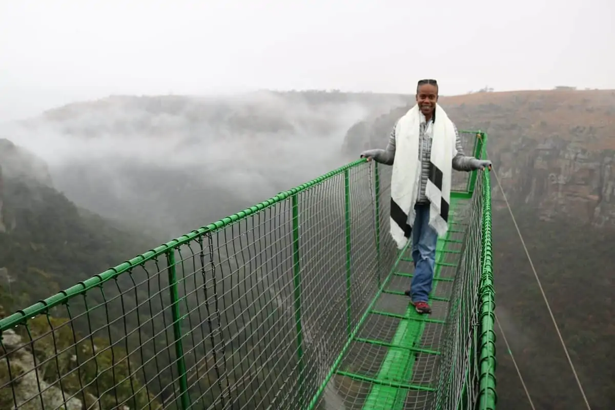 Production Designer Hannah Beachler on South African research trip at Oribi Gorge.
<br>Photo Credit: Location Mgr. Ilt Jones