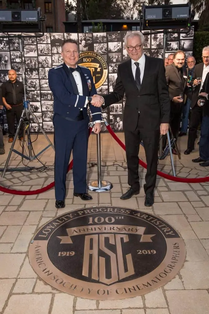 Colonel Terry Virts, alongside ASC President Kees van Oostrum, reveals the ASC's 100th Annoversary seal. Photo by Hector Sandoval