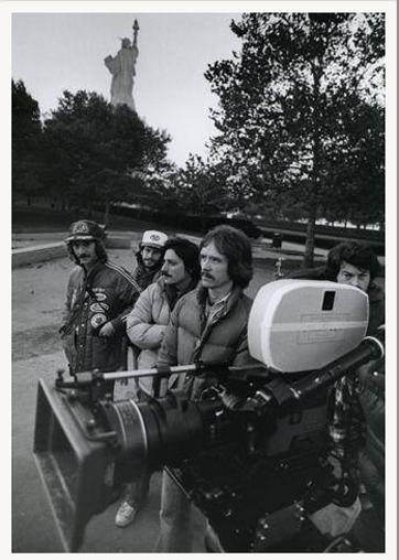 Crew_EFNY Dean Cundey ASC peeking out from behind the camera at right. From R-L: John Carpenter (director), Barry Bernardi (associate producer), Jeffrey Chernov (second AD)