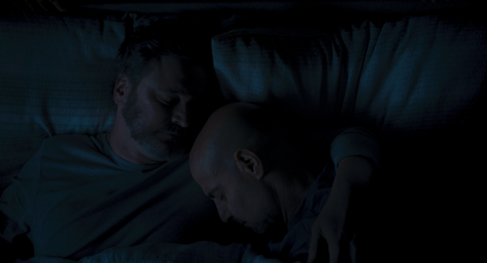 By popping out the camper van's roof lights Pope could<br />film straight down on Sam<br />and Tusker as they lay in bed