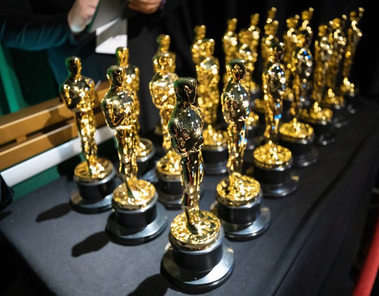 A table of Oscars trophies