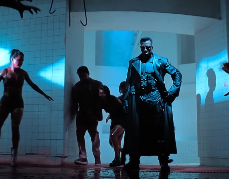 A still from Blade showing Blade surrounded by zombies
