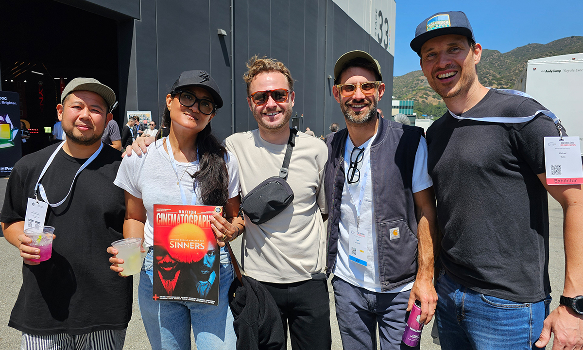 A group of people smiling into camera