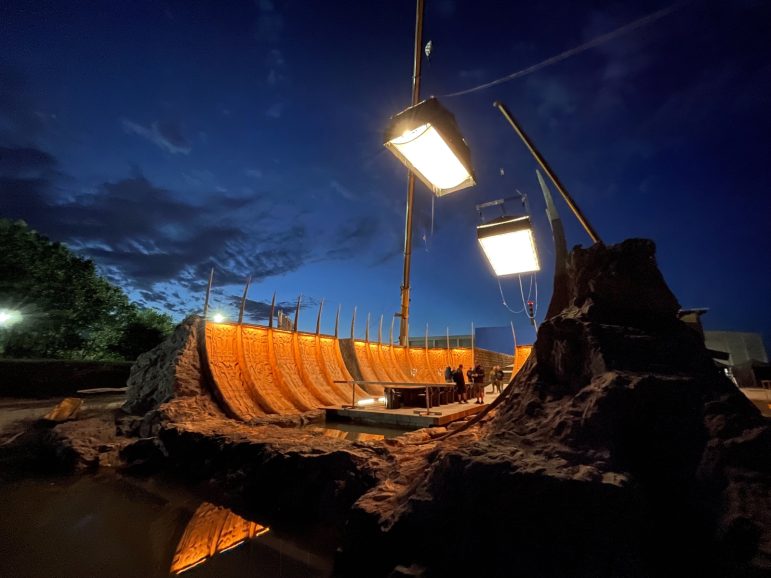 A set lit up at night