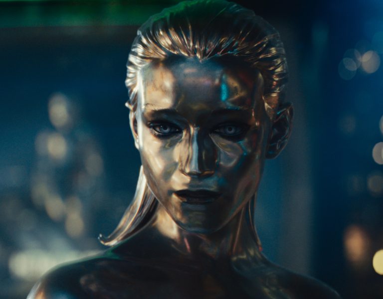 Julia Garner as the Silver Surfer gazes down onto an illuminated Times Square