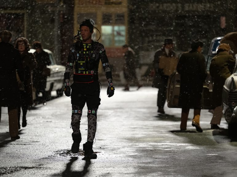 Ebon Moss-Bachrach on set wearing motion-capture gear