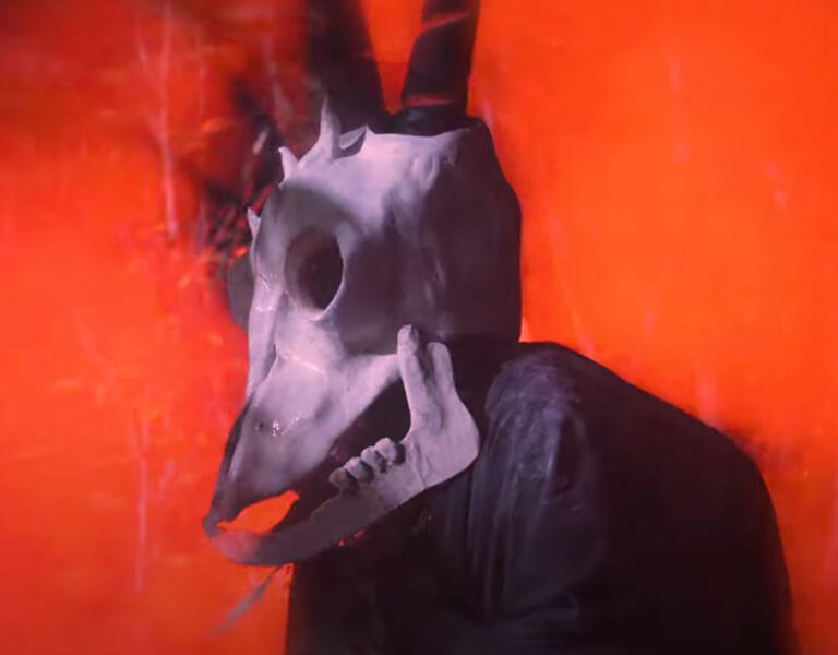 A person with a skull head