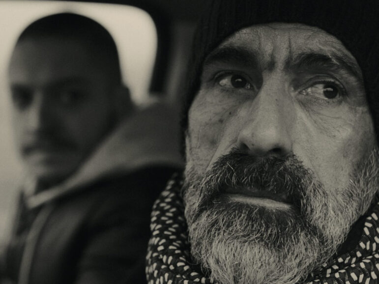 Two men sat in a van
