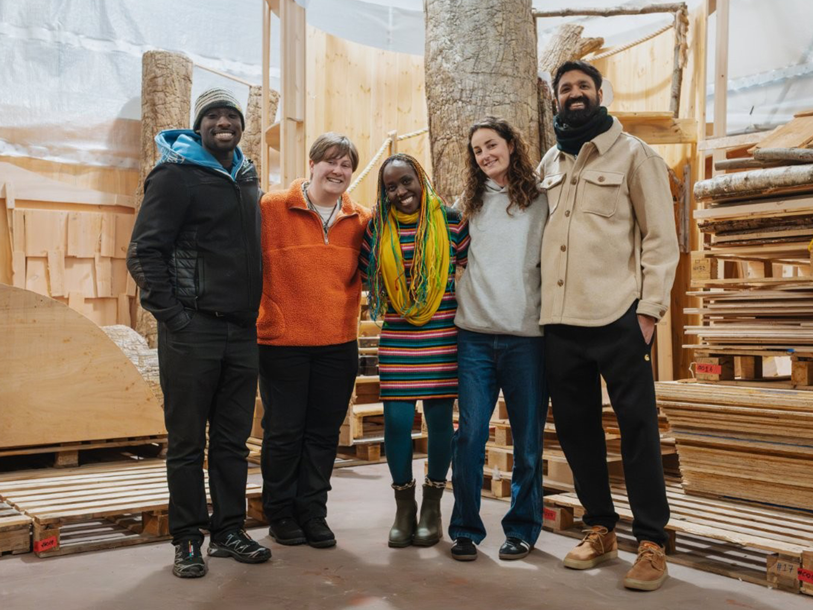 A group of people smiling together