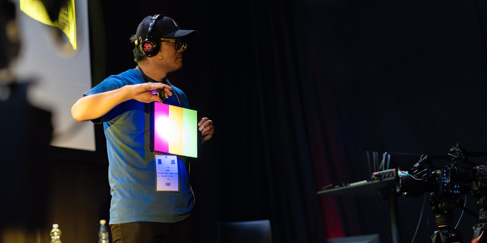 A man holding a light board