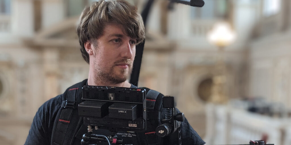 A man holding a camera