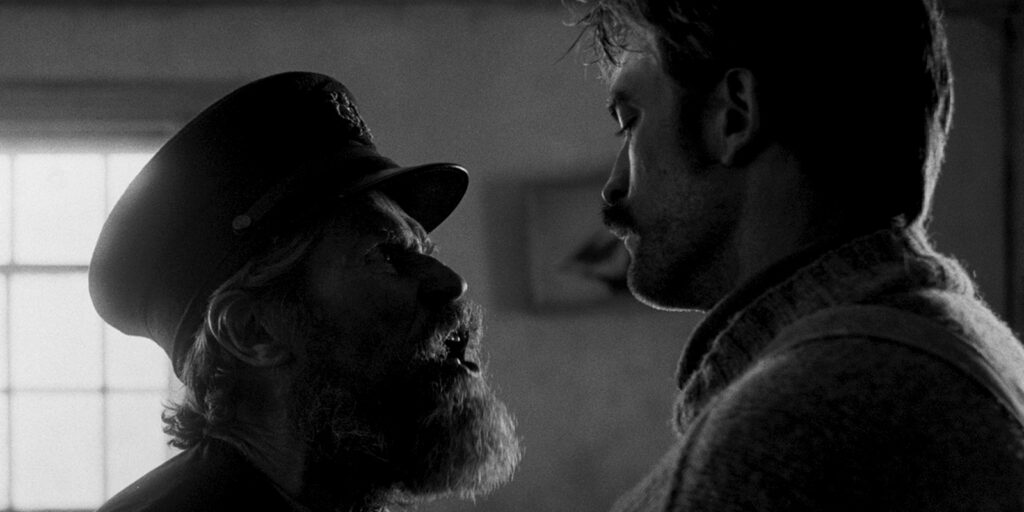 Two men staring at each other