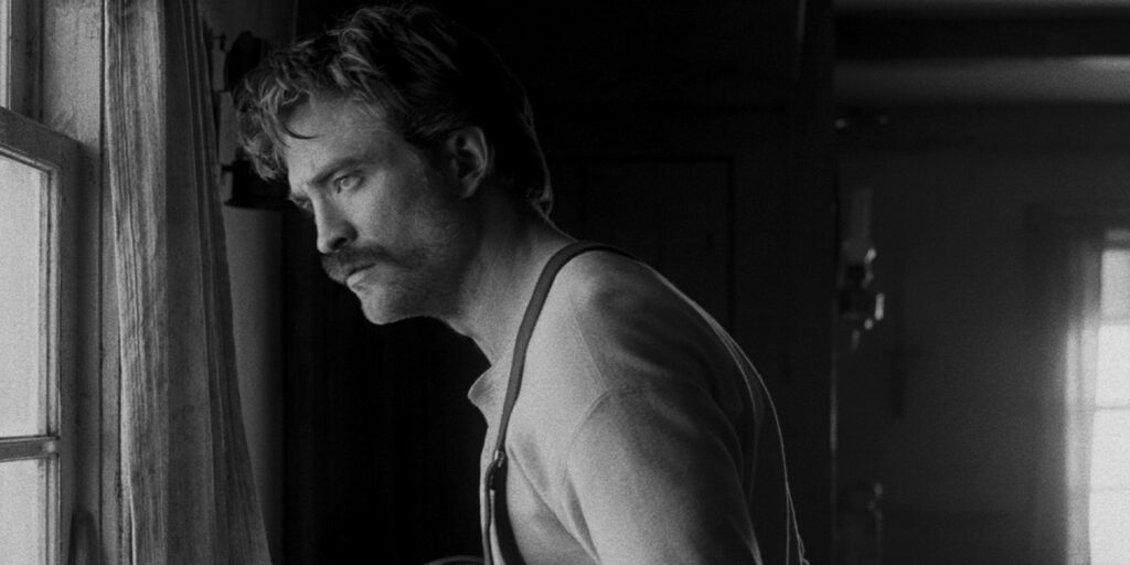 A man looking out of a window