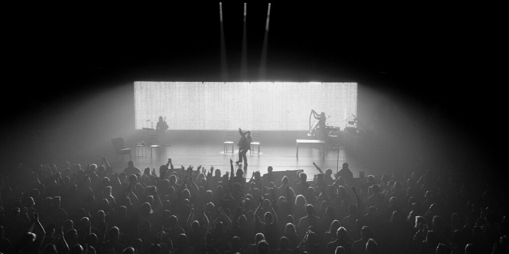 Bono performing on stage
