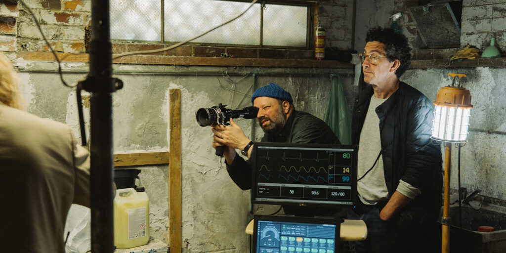 Film crew shooting in a basement