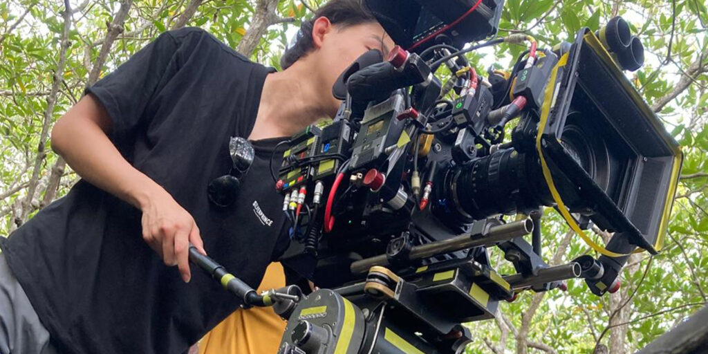 Darius Shu behind a camera