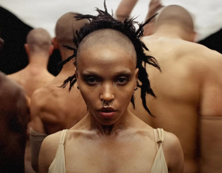 FKA twigs in front of a group of dancers