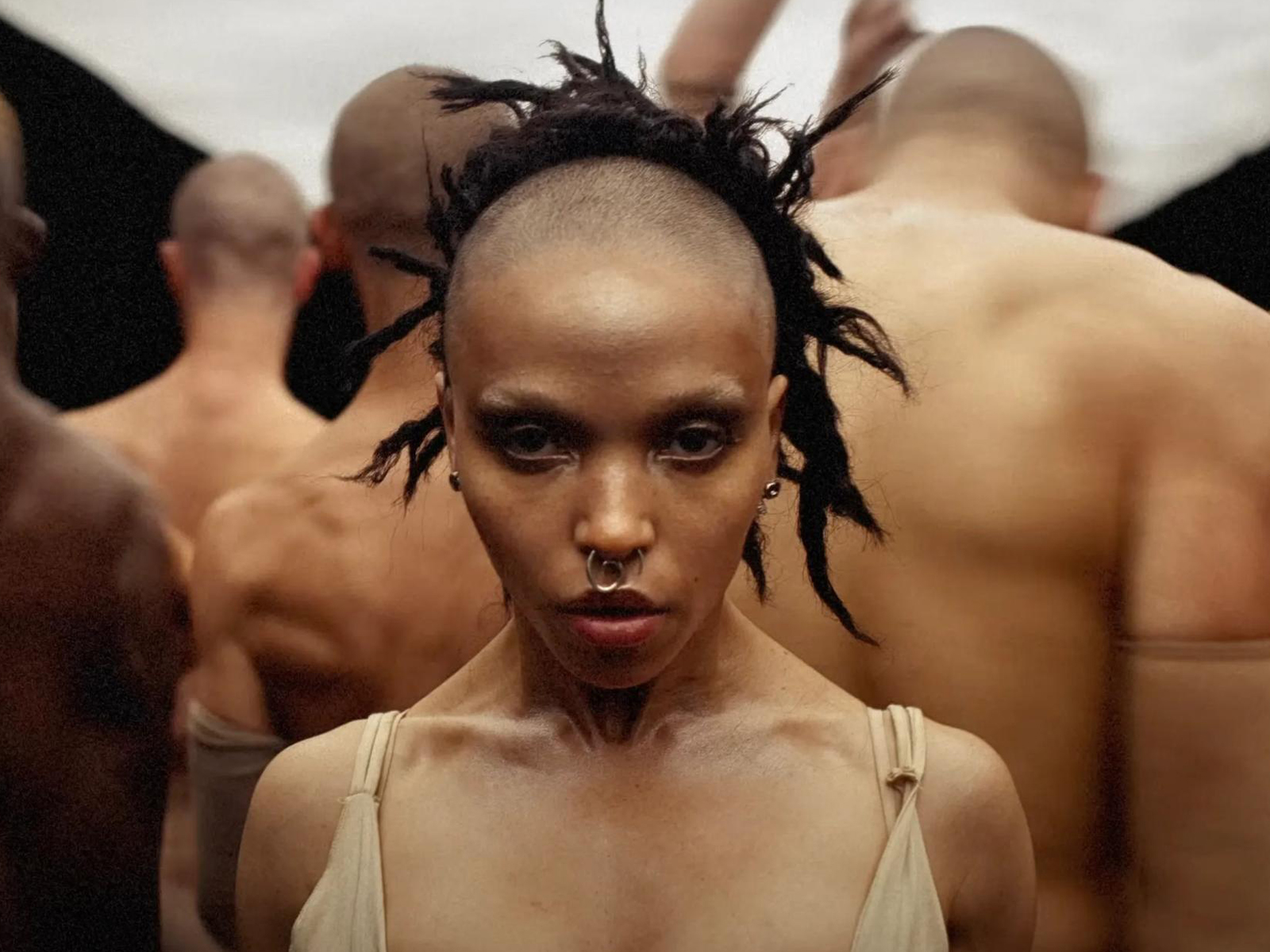 FKA twigs in front of a group of dancers
