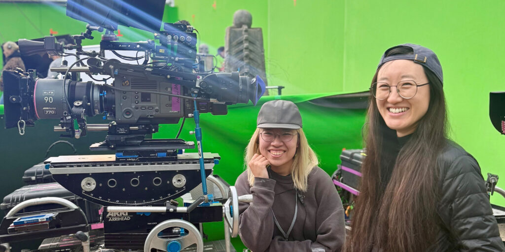 Two people smiling