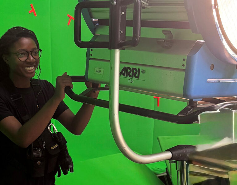 A person behind a lighting rig