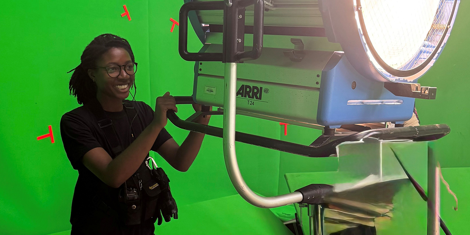 A person behind a lighting rig