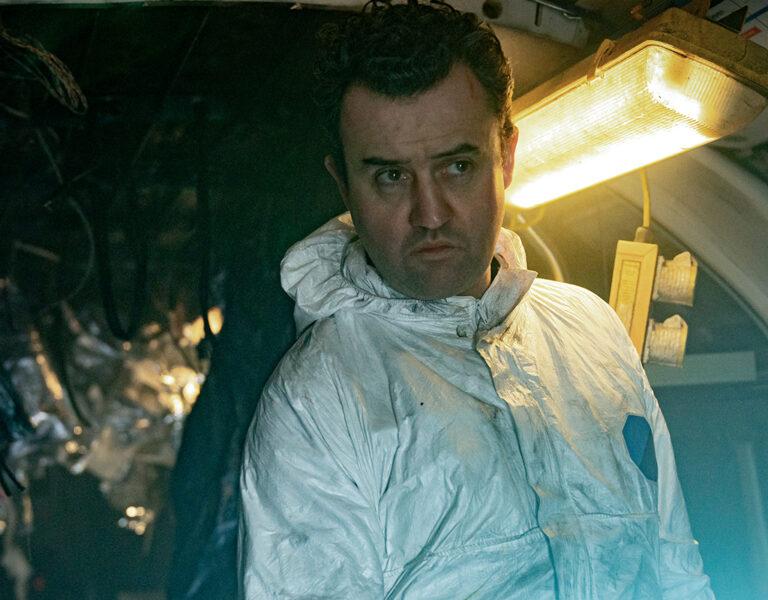 A man in a hazmat suit