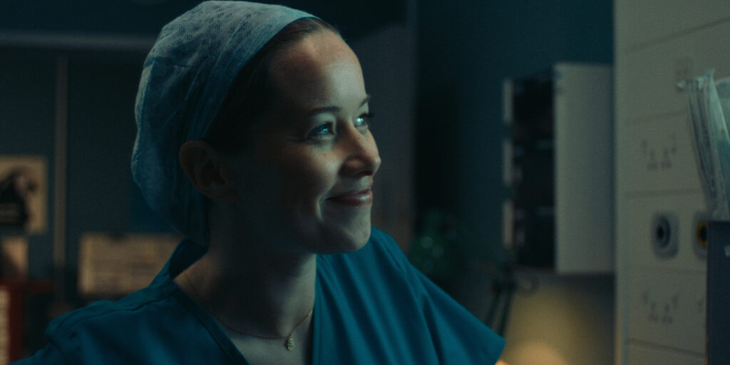 A nurse smiling