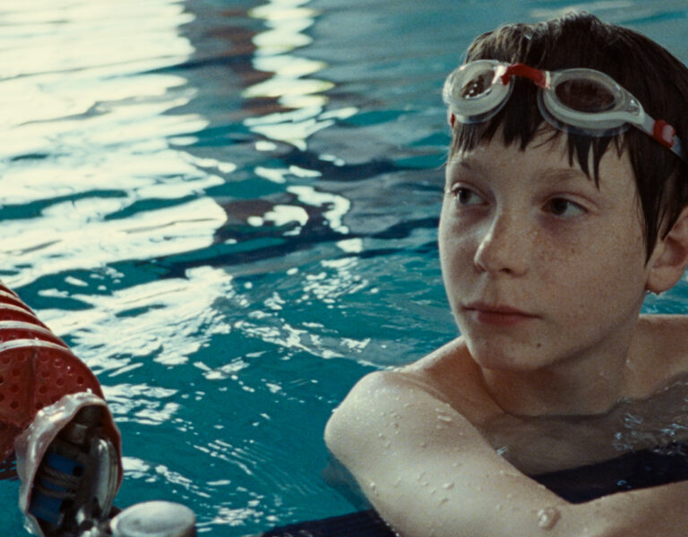 A boy in a swimming pool