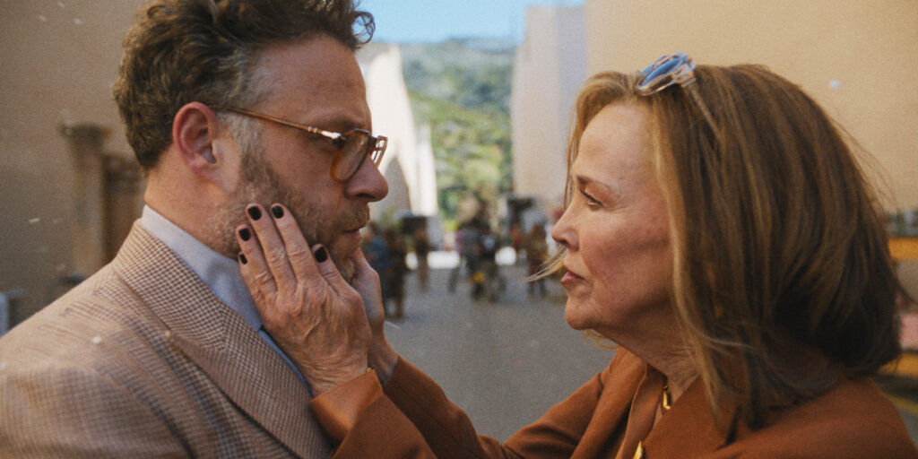 Two people embracing each other on a film set