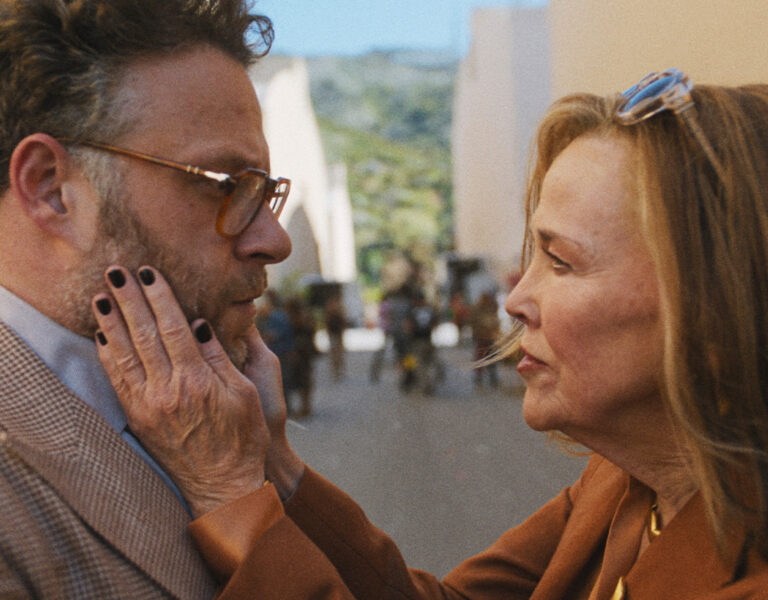 Two people embracing each other on a film set