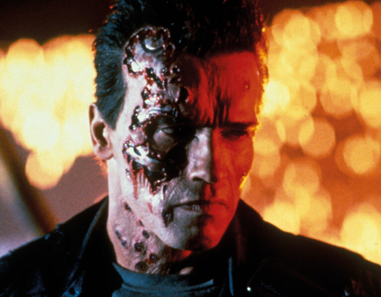 Arnold Schwarzenegger in The Terminator looking stern