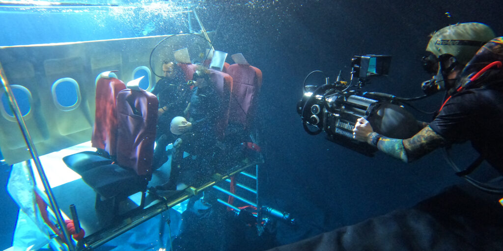 A film crew underwater