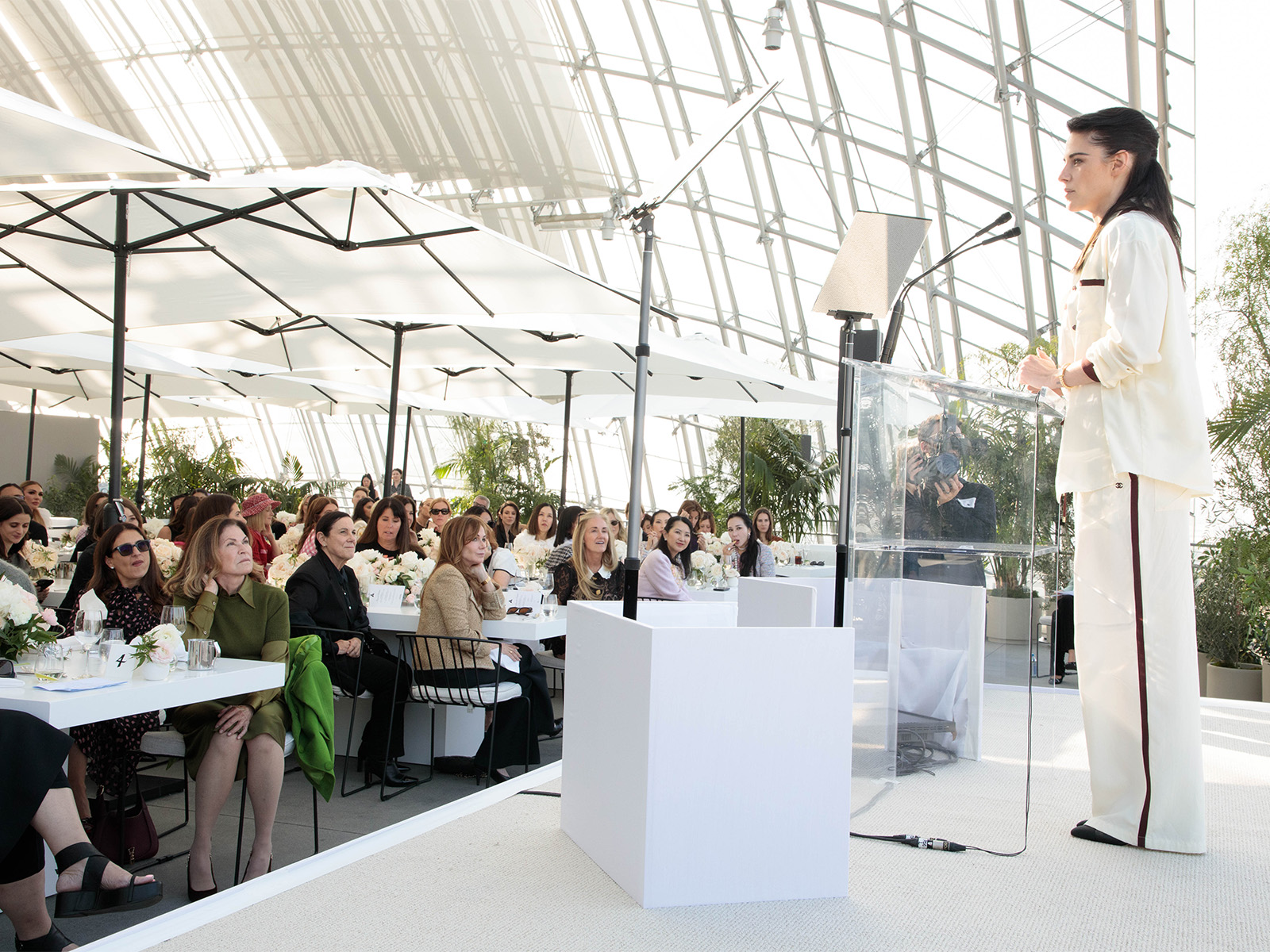 Kristen Stewart doing a talk to a room of people