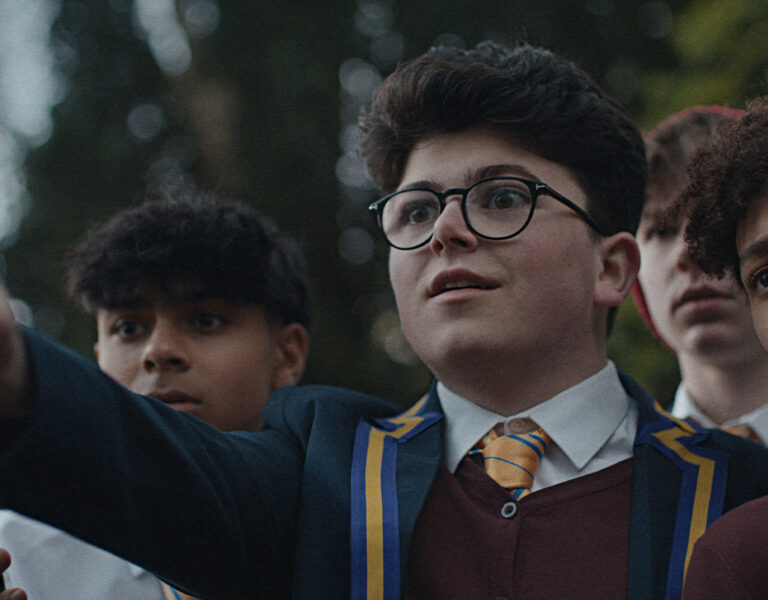 A group of boys looking shocked