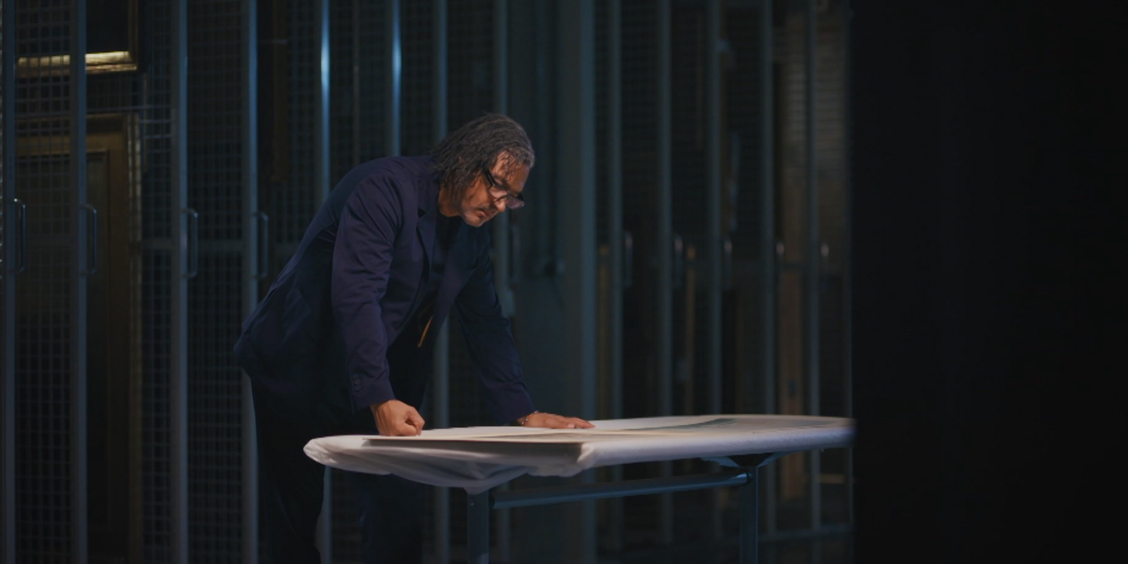 David Olusoga reading from a book