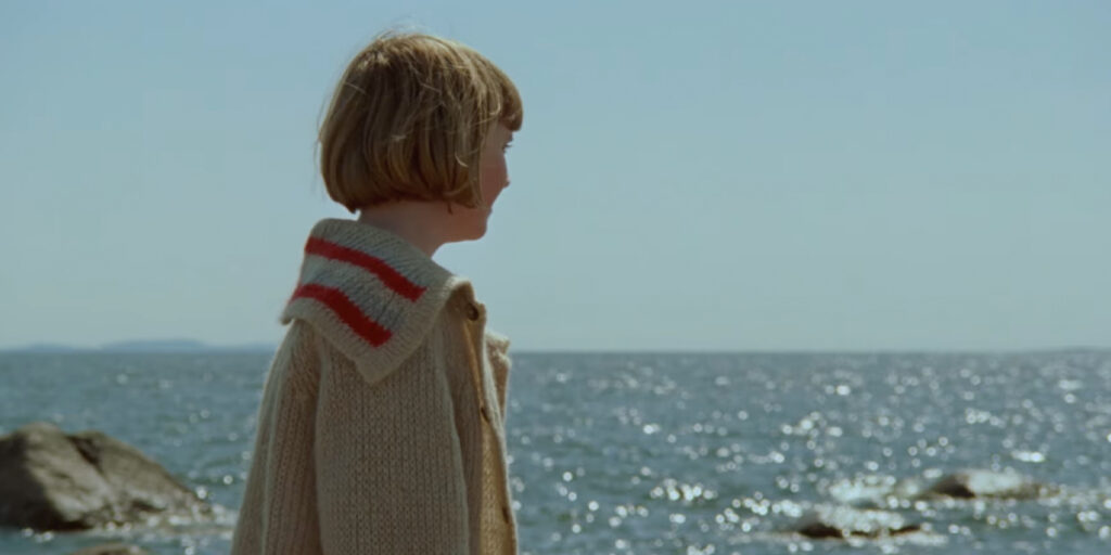 A girl looking out to sea
