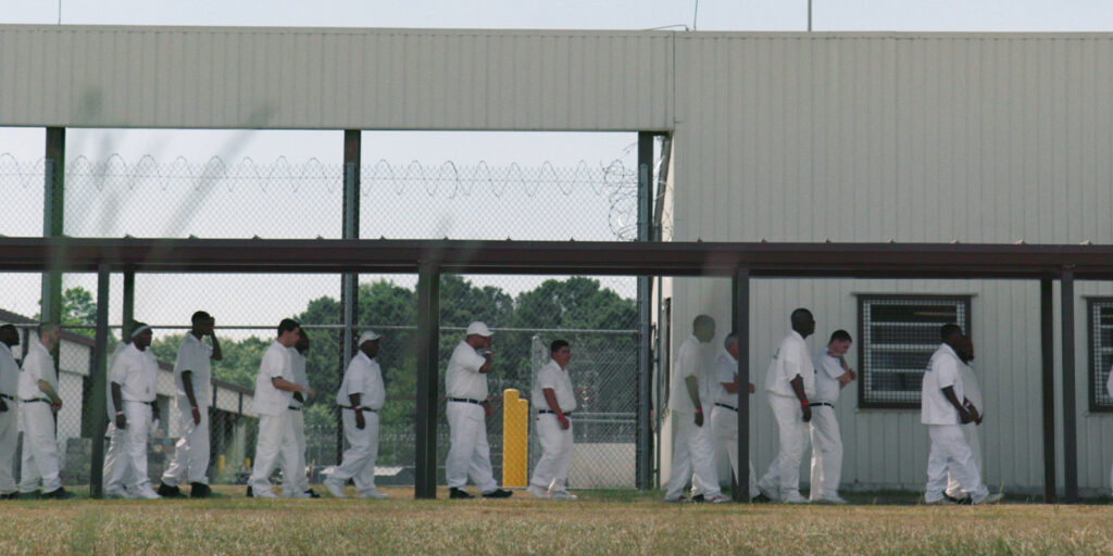 Inmates walking together outside