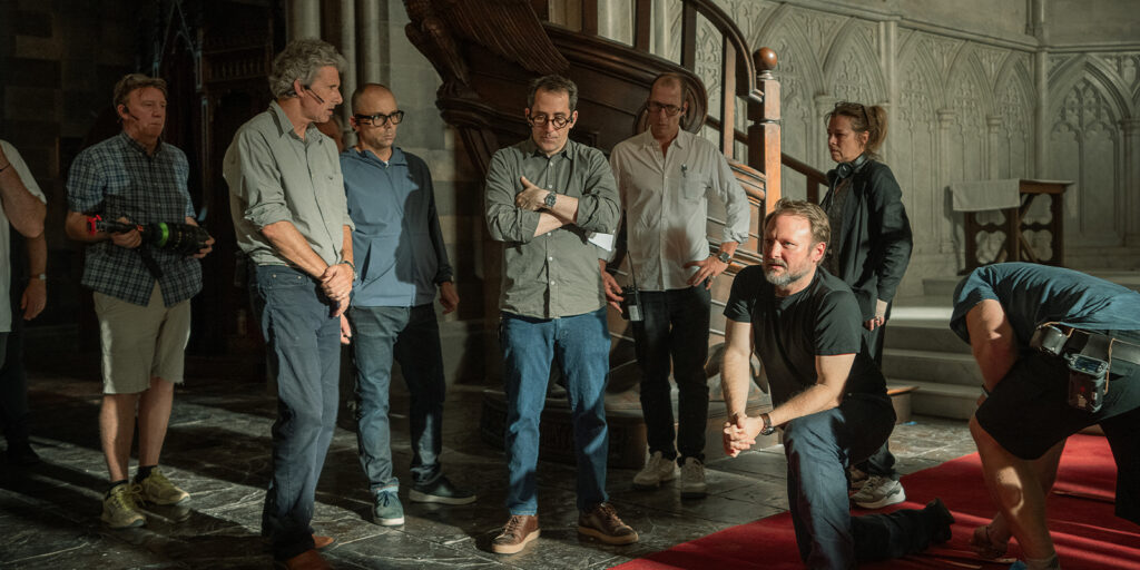 Crew members in a manor