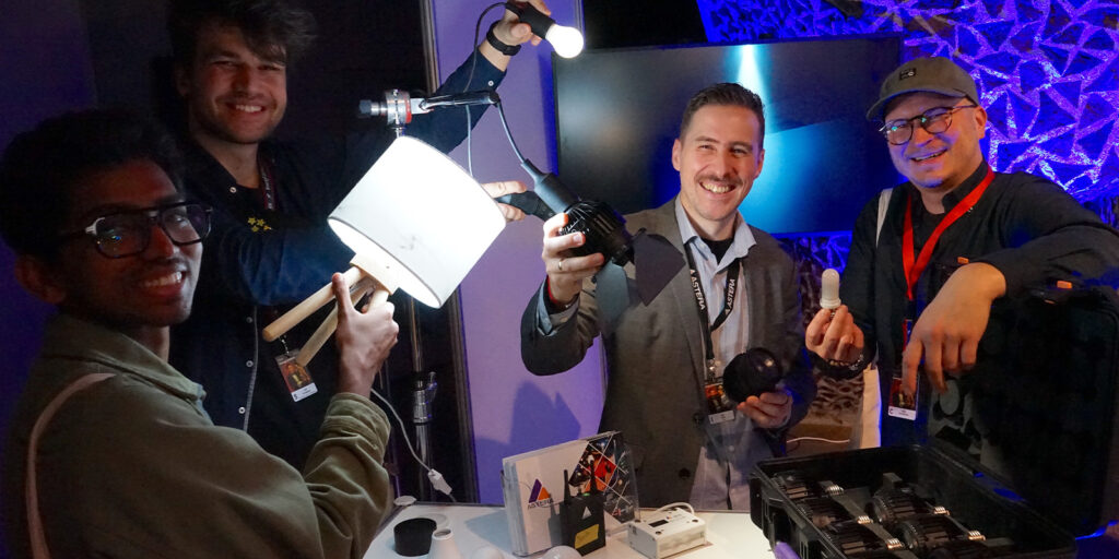 People posing with a light