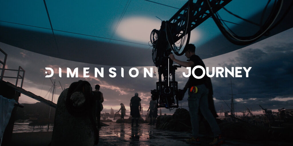 A film crew works on a set with a large camera rig under an artificial sky. Silhouetted figures and equipment are visible, with the words DIMENSION JOURNEY overlaid in bold white text, capturing the essence of global film-making.