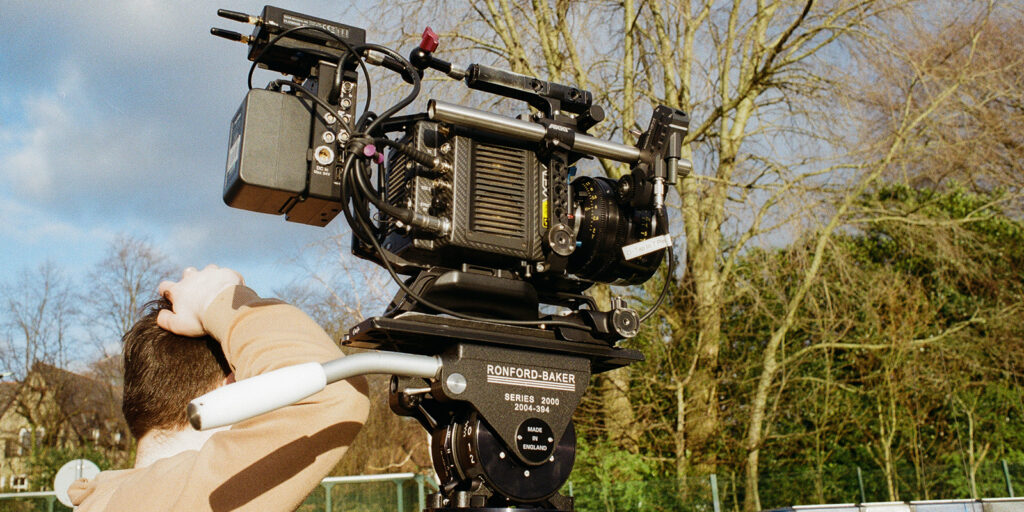 A large camera in a field