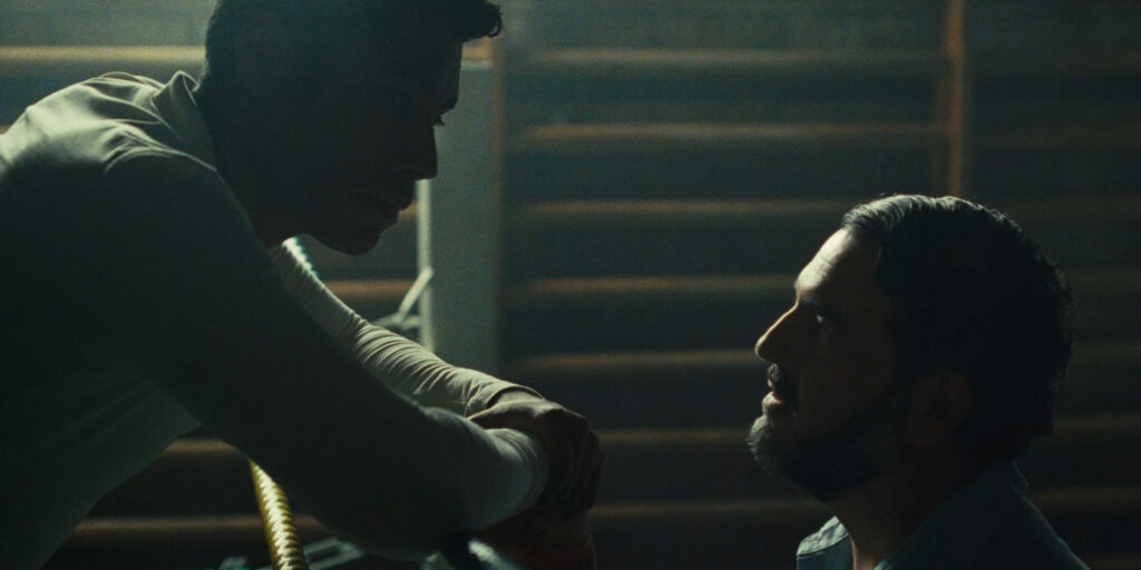 Two people staring each other down