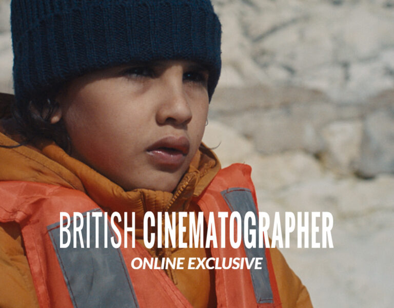A child wearing an orange life jacket and navy knitted hat looks into the distance. The background shows a light-coloured stone wall. Text across the image reads, BRITISH CINEMATOGRAPHER ONLINE EXCLUSIVE with Rick Joaquim, SASC.