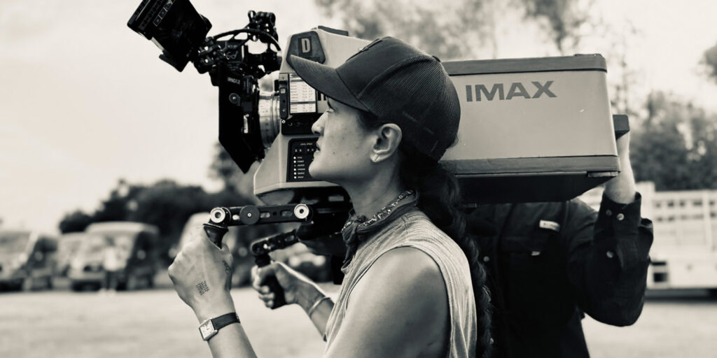 Autumn Durald Arkapaw ASC with a camera on her shoulder