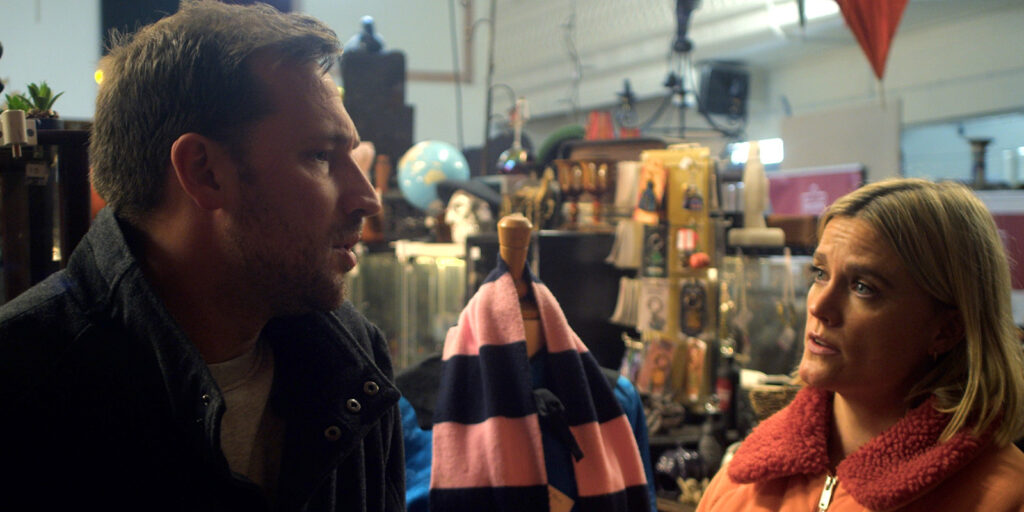 A man and woman looking at each other