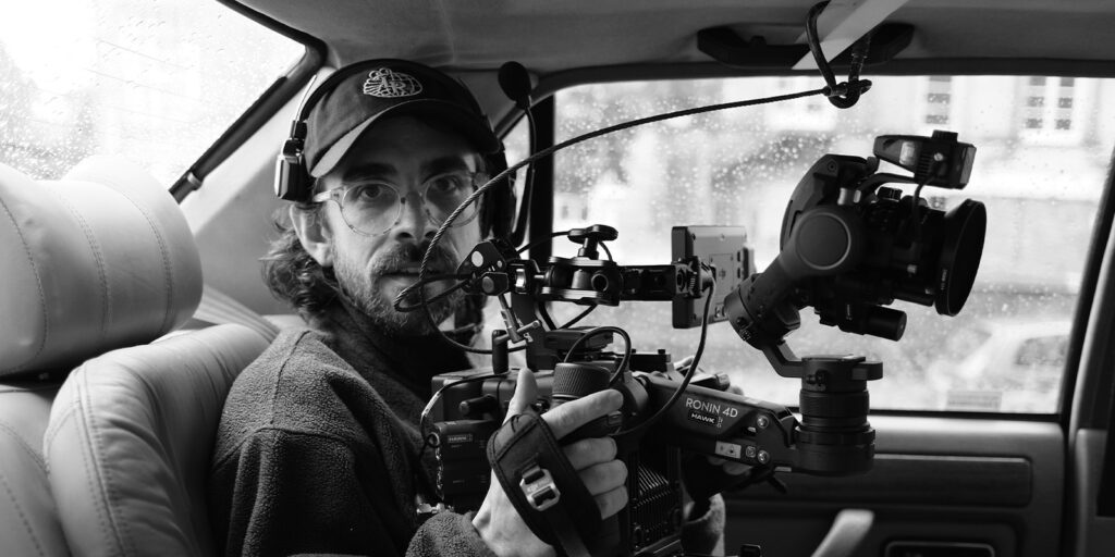 A man holding a camera